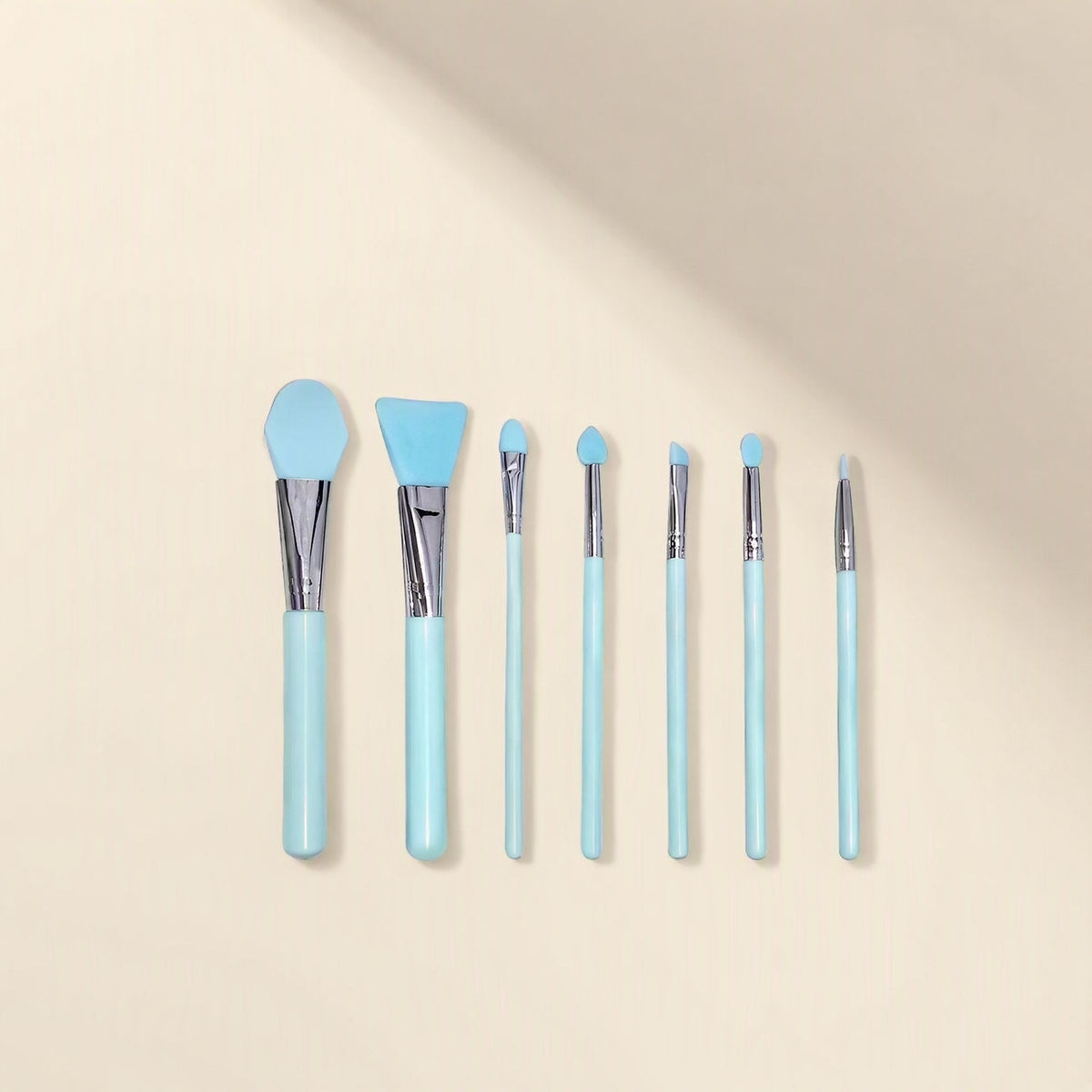 Seven-piece silicone facial mask brush set with plastic handles