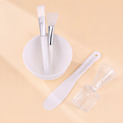 White silicone facial mask bowl set with mask-preparation tools