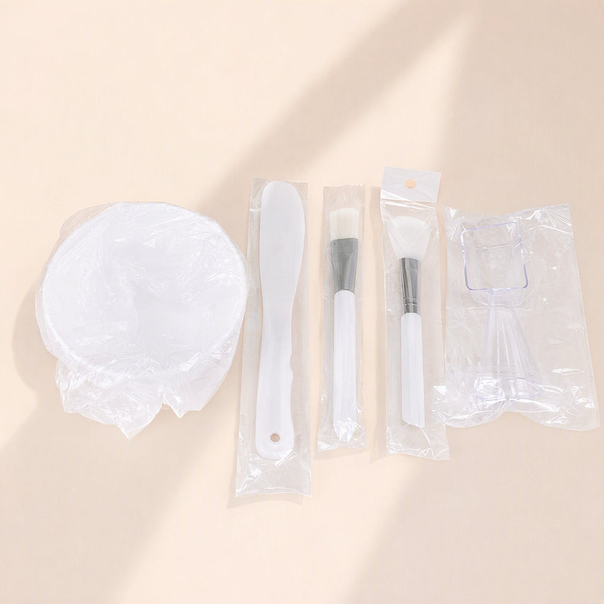 White silicone facial mask bowl set with mask-preparation tools - view 2